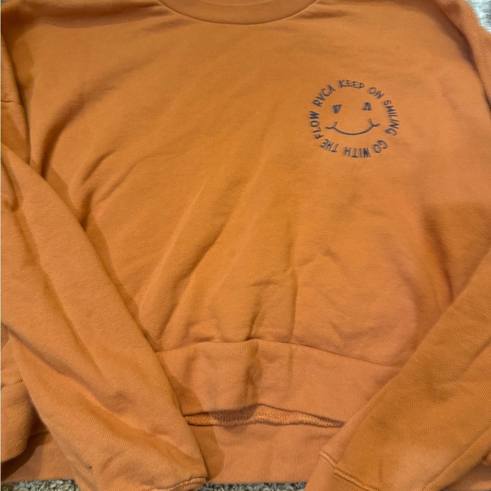 RVCA Orange Crewneck Sweatshirt with Small Chest Smiley Logo